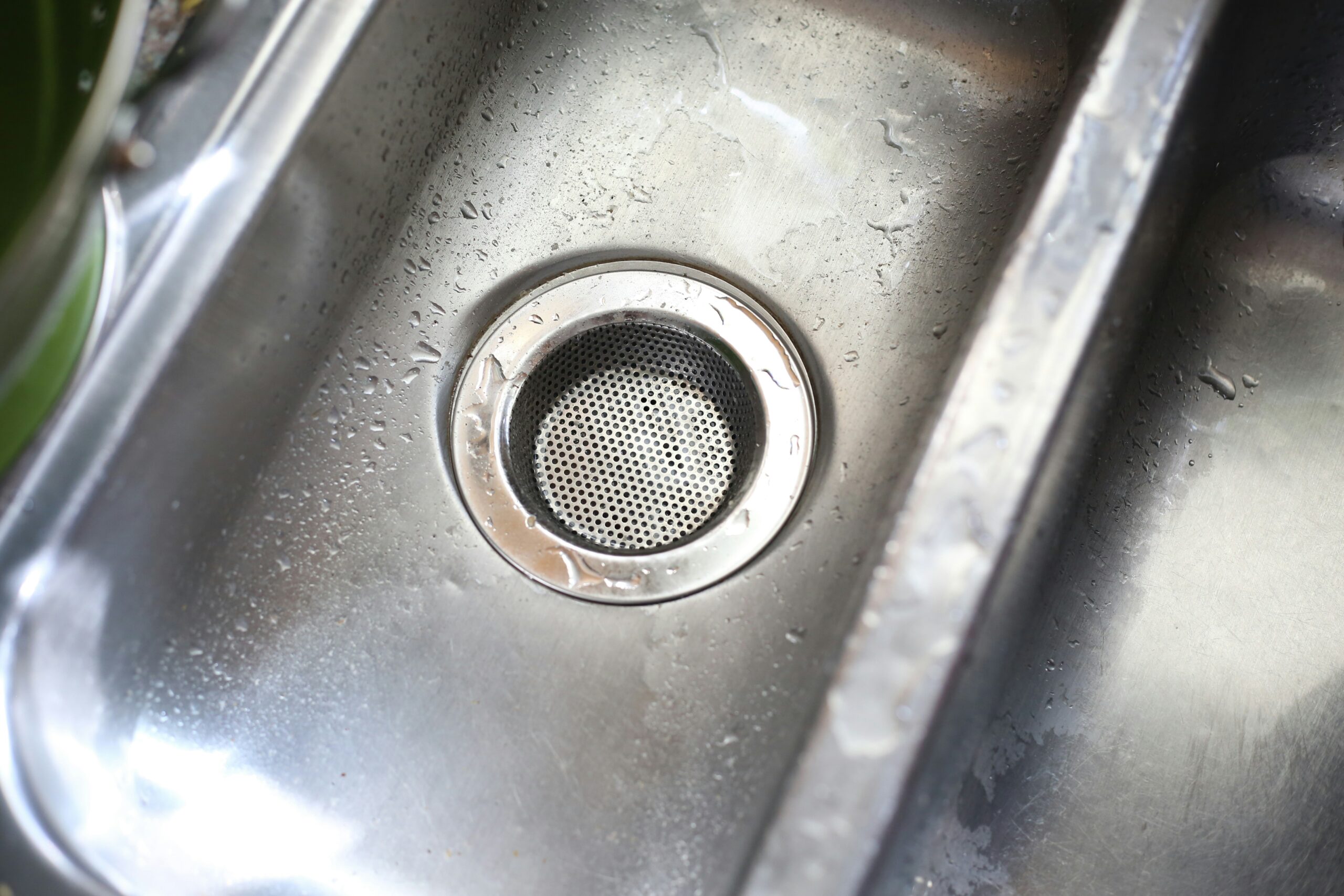 Drain Overflows When Washing Machine Drains