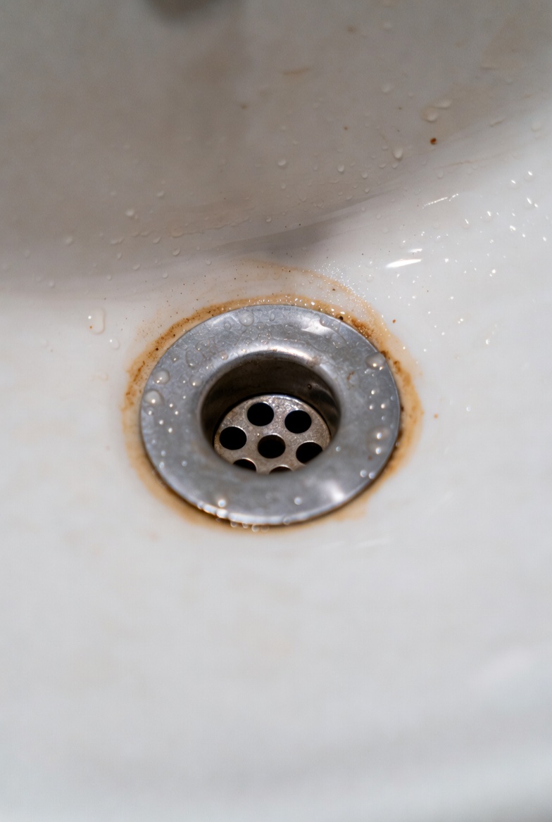 Bad odor at sink drain tied to trap and seal issues