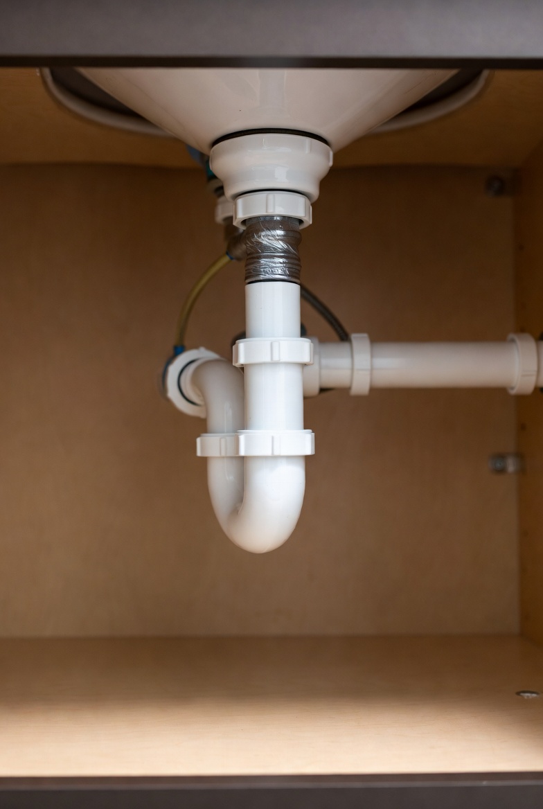 P-trap holding water constantly due to poor geometry