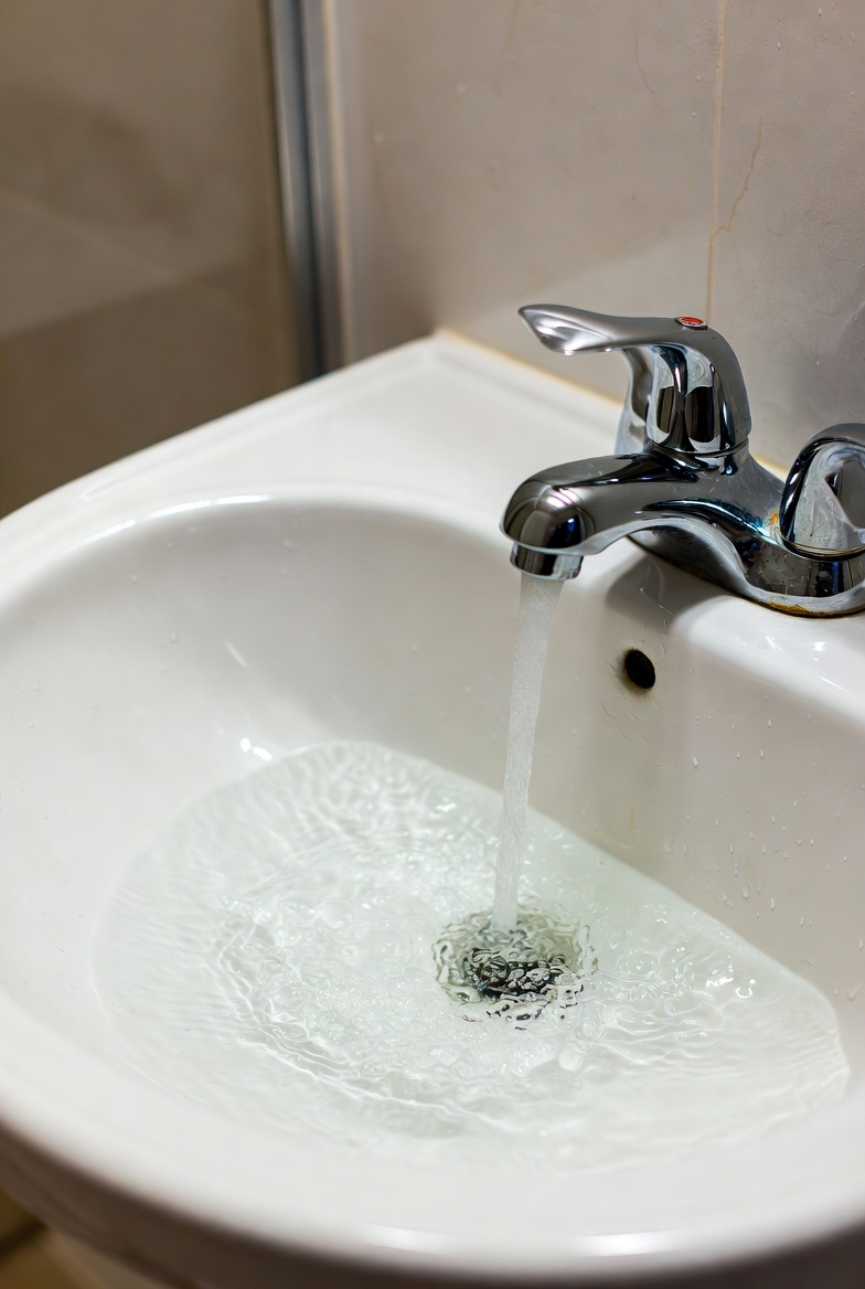 Single bathroom sink slow while others normal