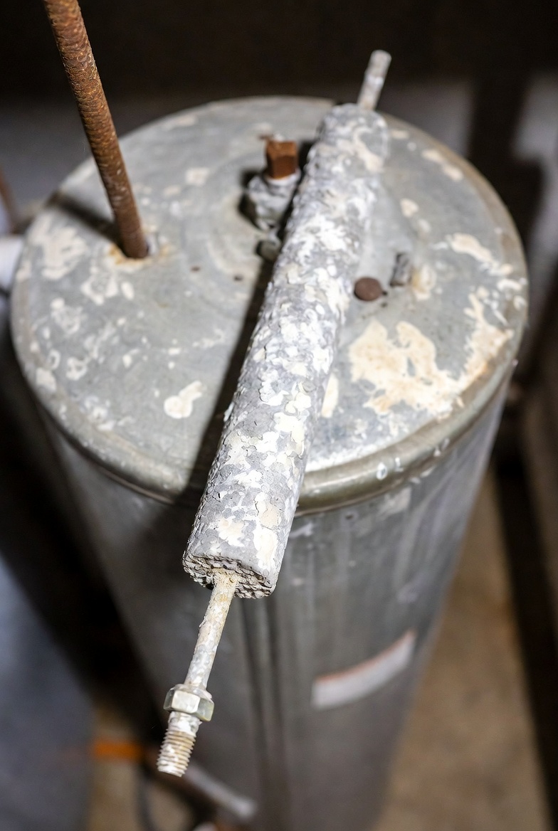 Corroded anode rod releasing sulfur odor