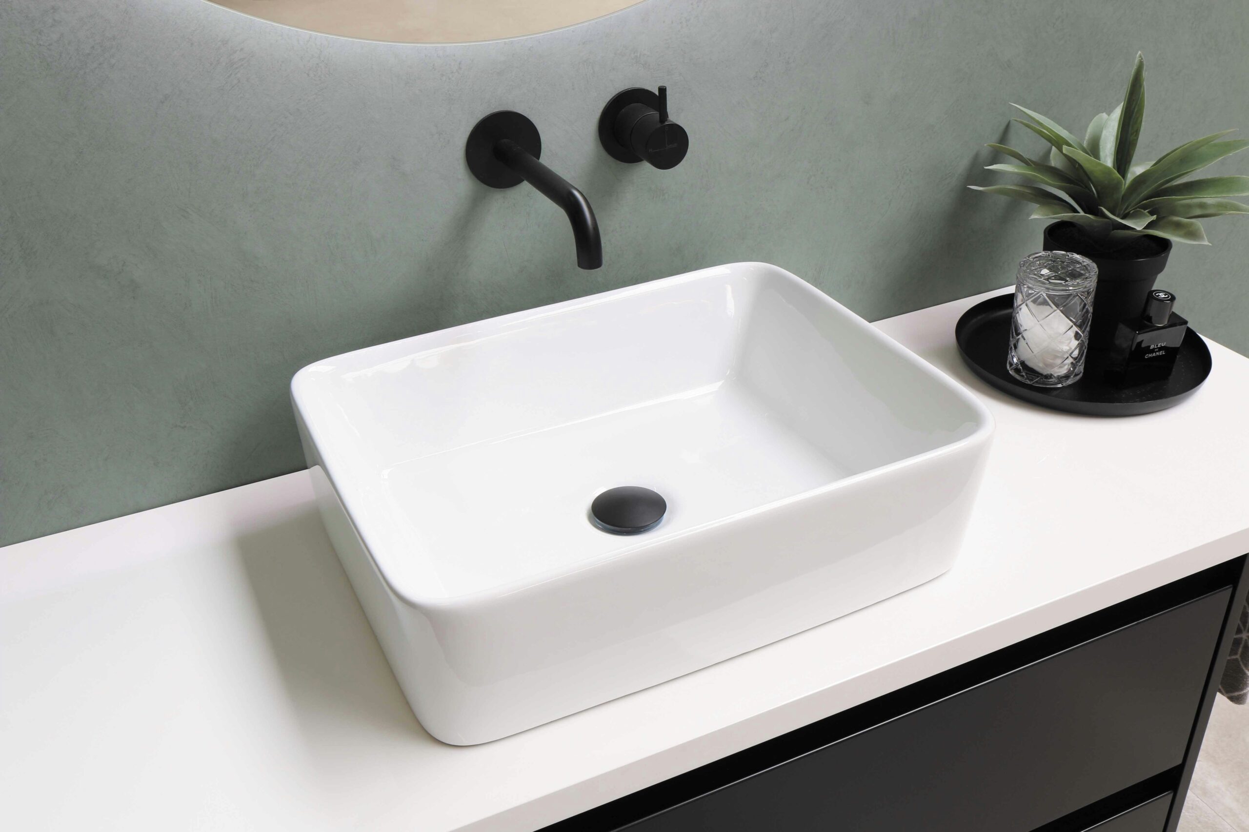 A bathroom sink basin and faucet viewed from above